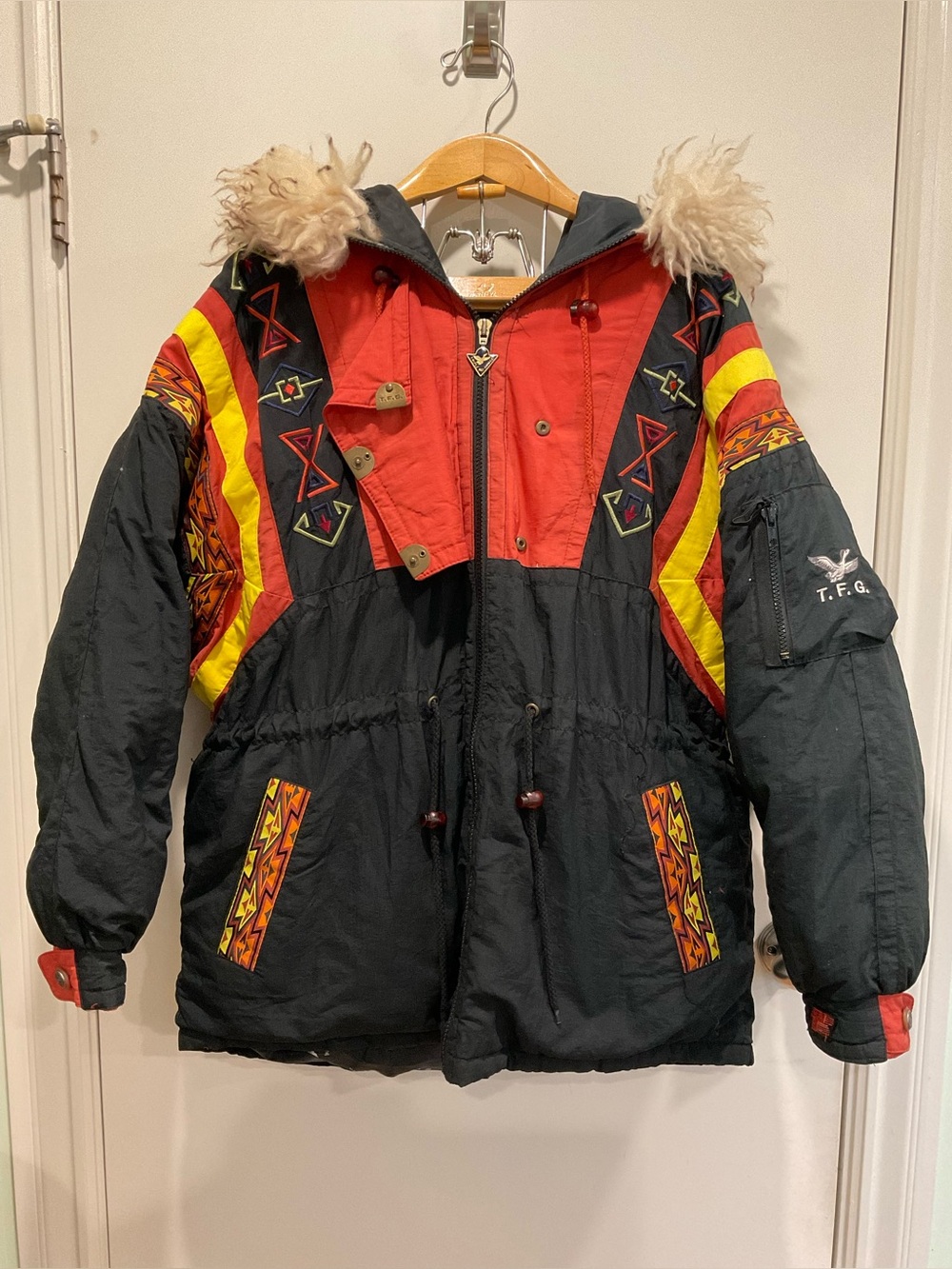 This vintage Triple F.A.T. Goose duck down ski parka features a striking.